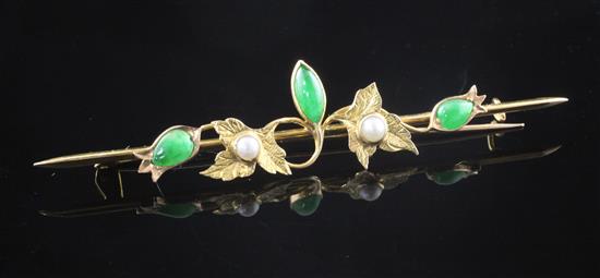 An 18ct gold, jadeite and split pearl set bar brooch, 3in.